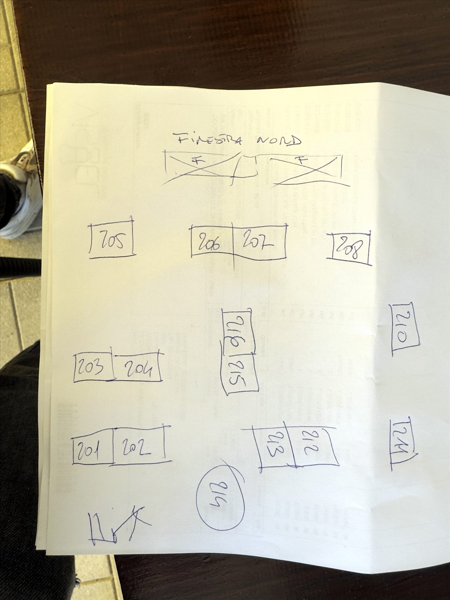 Hand-drawn floor plan with tables 201 and 202