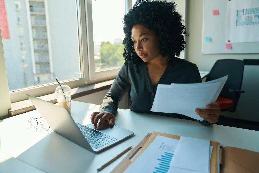 Woman working on a computer in the office